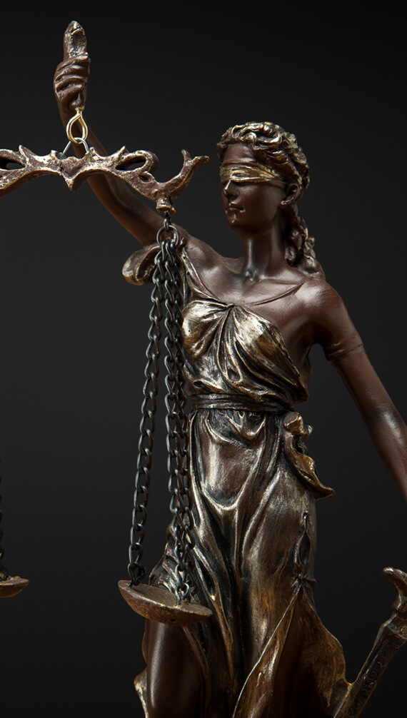 bronze statuette with scales of justice isolated o 253MJCL.jpg